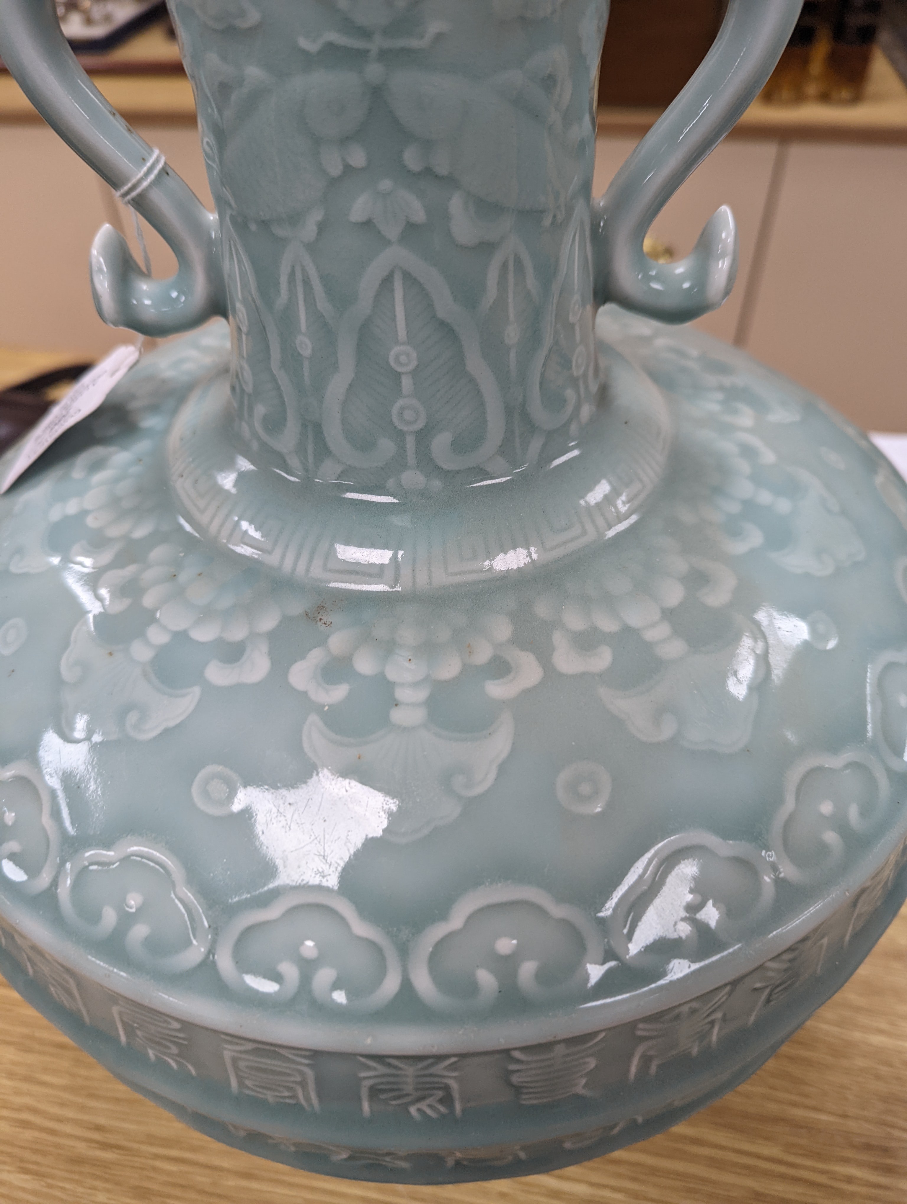 A large Chinese celadon glazed ‘Hundred Shou’ vase 41cm